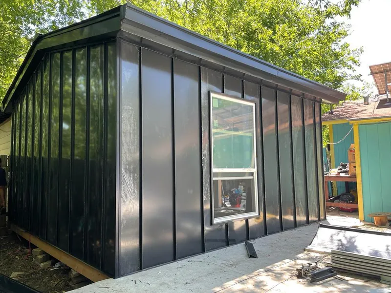 Black standing seam metal wall panels for Metal Roof Installation in North Strabane